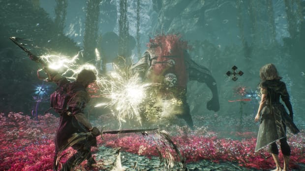 Clair Obscur: Expedition 33 screenshot. Man unleashes a magical attack at a giant red-haired monster wearing a white mask.