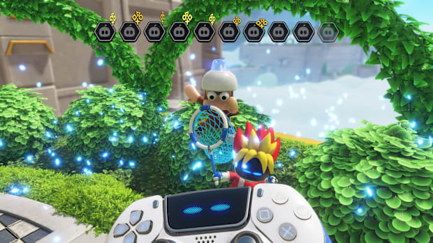 Astro Bot and the ape from Ape Escape with a DualSense controller in the foreground. 