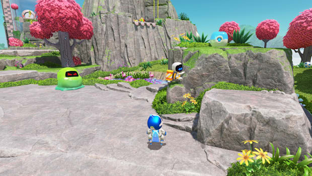 A bot clinging to a rock in Astro Bot's Sky Garden.