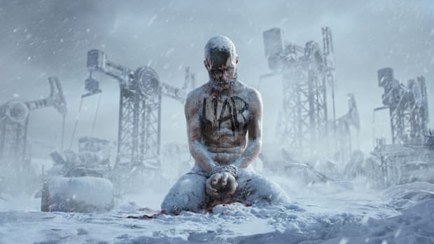 A citizen in Frostpunk 2 with LIAR painted across his chest in black letters