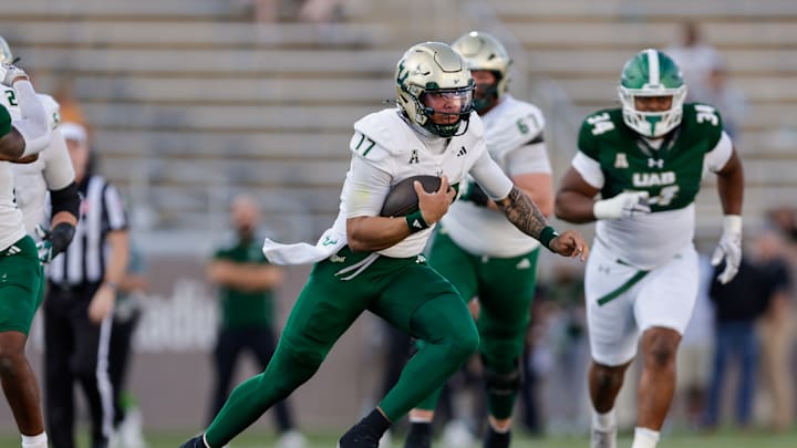USF fans await the next move by quarterback Byrum Brown.
