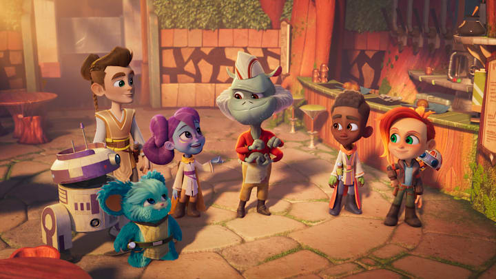 (L-R): R0-M1, Nubs (voiced by Dee Bradley Baker), Wes Vinik (voiced by Gunnar Sizemore), Lys Solay (voiced by Juliet Donenfeld), Hap (voiced by Taran Killam), Kai Brightstar (voiced by Jecobi Swain), Nash Durango (voiced by Emma Berman), and RJ-83 from "STAR WARS: YOUNG JEDI ADVENTURES (Season 2)", exclusively on Disney+ and Disney Junior. © 2024 Lucasfilm Ltd. & ™. All Rights Reserved.