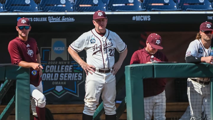 Jun 19, 2022; Omaha, NE, USA; Texas A&M Aggies head coach Jim Schlossnagle watches late game action against the Texas Longhorns at Charles Schwab Field. Mandatory Credit: Steven Branscombe-USA TODAY Sports