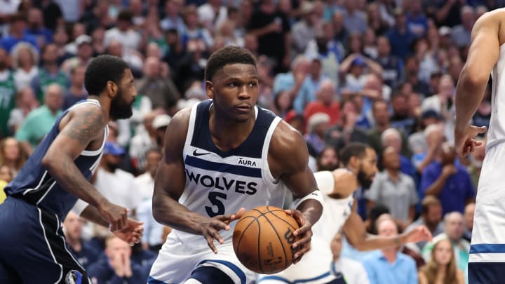 Minnesota Timberwolves guard Anthony Edwards (5) dribbles against the Dallas Mavericks during the fourth quarter of Game 4 of the Western Conference finals at American Airlines Center in Dallas on May 28, 2024.