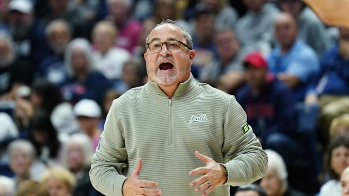 Nov 10, 2024; Storrs, Connecticut, USA; South Florida Bulls head coach Jose Fernandez watches from the sideline as they take on the UConn Huskies at Harry A. Gampel Pavilion. Mandatory Credit: David Butler II-Imagn Images Nov 10, 2024; Storrs, Connecticut, USA; South Florida Bulls head coach Jose Fernandez watches from the sideline as they take on the UConn Huskies at Harry A. Gampel Pavilion. Mandatory Credit: David Butler II-Imagn Images