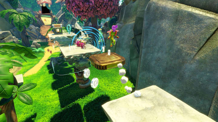 Yooka jumping onto a golden platform in Yooka Replaylee
