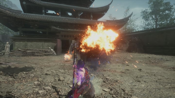 Weilding a battleaxe as the enemy spits fire towards  you.