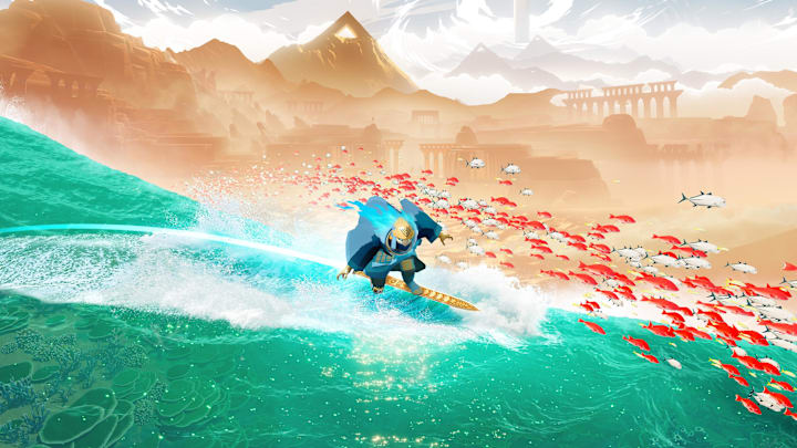 A person in a blue cape surfing along a wave of water with desert ruins in the background as a school of fish leap.