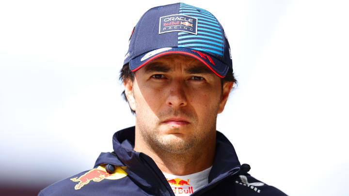 19th placed qualifier Sergio Perez of Mexico and Oracle Red Bull Racing walks in the Pitlane during qualifying ahead of the F1 Grand Prix of Great Britain at Silverstone Circuit on July 06, 2024 in Northampton, England.