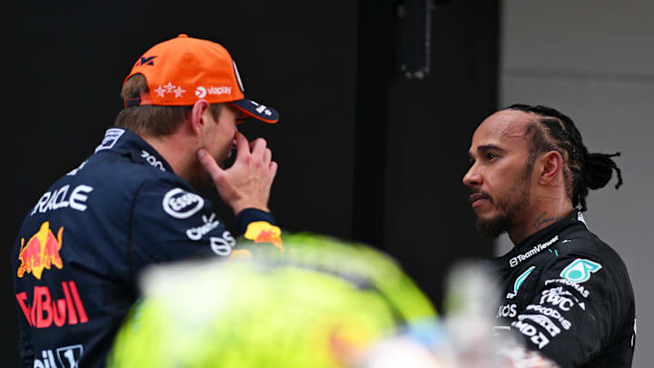 Race winner Max Verstappen of the Netherlands and Oracle Red Bull Racing and Third placed Lewis Hamilton of Great Britain and Mercedes celebrate in parc ferme during the F1 Grand Prix of Spain at Circuit de Barcelona-Catalunya on June 23, 2024 in Barcelona, Spain. (Photo by Rudy Carezzevoli/Getty Images)