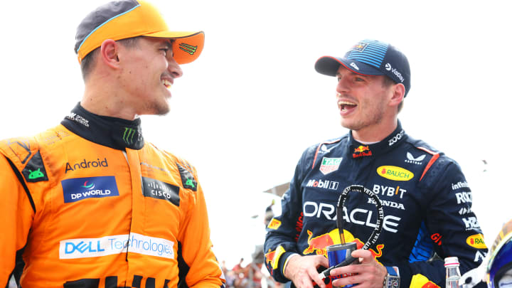 Race winner Max Verstappen of the Netherlands and Oracle Red Bull Racing and Second placed Lando Norris of Great Britain and McLaren talk in parc ferme during the F1 Grand Prix of Emilia-Romagna at Autodromo Enzo e Dino Ferrari Circuit on May 19, 2024 in Imola, Italy.