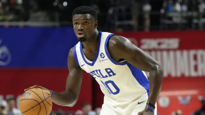 Jul 15, 2024; Las Vegas, NV, USA; Philadelphia 76ers forward/center Adem Bona (30) dribbles the ball against the Portland Trail Blazers during the second half at Thomas & Mack Center. Mandatory Credit: Lucas Peltier-USA TODAY Sports