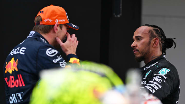 Race winner Max Verstappen of the Netherlands and Oracle Red Bull Racing and Third placed Lewis Hamilton of Great Britain and Mercedes celebrate in parc ferme during the F1 Grand Prix of Spain at Circuit de Barcelona-Catalunya on June 23, 2024 in Barcelona, Spain. (Photo by Rudy Carezzevoli/Getty Images)