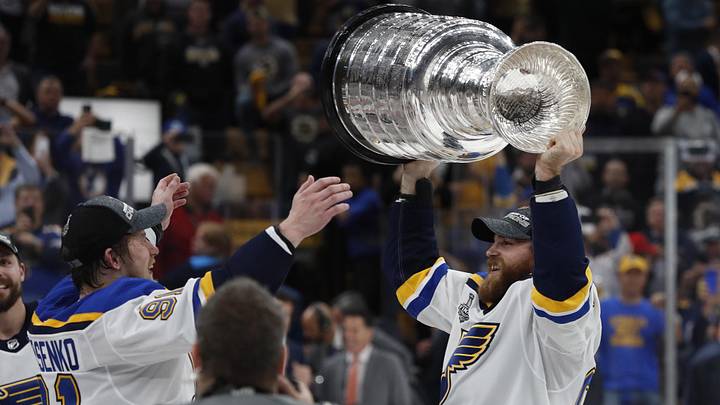 Jun 12, 2019; Boston, MA, USA; St. Louis Blues center Ryan O'Reilly (90) passes the Stanley Cup to right wing Vladimir Tarasenko (91) after defeating the Boston Bruins in game seven of the 2019 Stanley Cup Final at TD Garden. Mandatory Credit: Winslow Townson-Imagn Images
