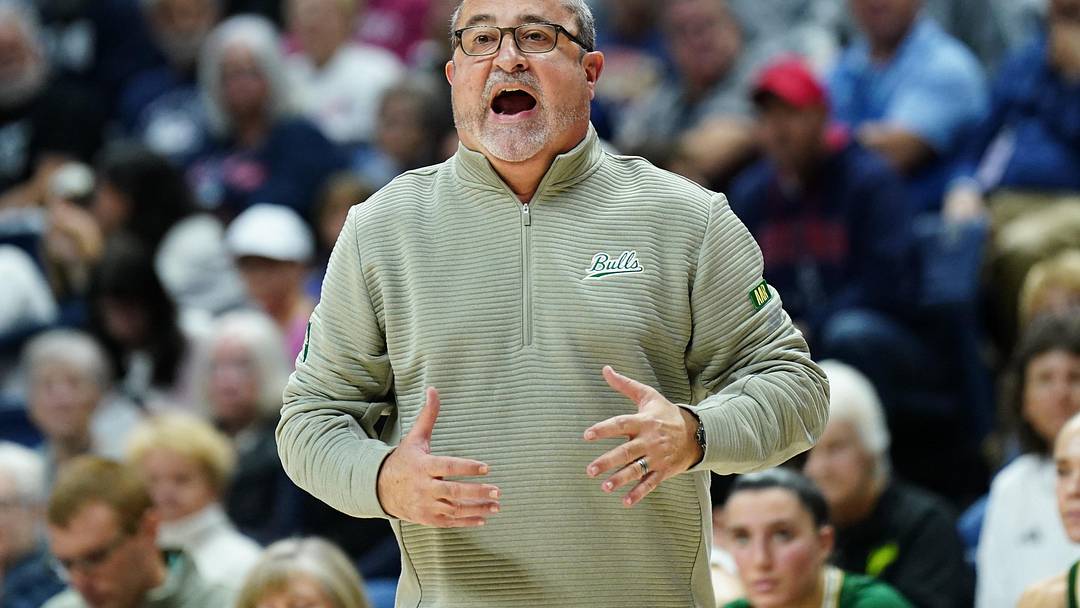 Nov 10, 2024; Storrs, Connecticut, USA; South Florida Bulls head coach Jose Fernandez watches from the sideline as they take on the UConn Huskies at Harry A. Gampel Pavilion. Mandatory Credit: David Butler II-Imagn Images