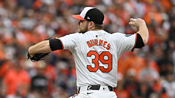 Oct 1, 2024; Baltimore, Maryland, USA; Baltimore Orioles pitcher Corbin Burnes (39) throws a pitch against the Kansas City Royals in the first inning in game one of the Wild Card round for the 2024 MLB Playoffs at Oriole Park at Camden Yards. Mandatory Credit: Tommy Gilligan-Imagn Images
