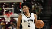 Jul 14, 2025; Las Vegas, NV, USA; San Antonio Spurs guard Dylan Harper dribbles the ball against the Utah Jazz during the second half of a NBA basketball game at the Thomas & Mack Center. Mandatory Credit: Lucas Peltier-Imagn Images