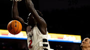 Cincinnati Bearcats center Moustapha Thiam (52) dunks in the second half of the NCAA basketball game against the Georgia State Panthers at Fifth Third Arena in Cincinnati on Nov. 7, 2025.