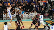 Duke forward and NBA Draft star Cooper Flagg shoots against Houston Cougars' J'Wan Roberts during the 2025 NCAA Tournament