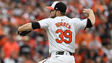 Oct 1, 2024; Baltimore, Maryland, USA; Baltimore Orioles pitcher Corbin Burnes (39) throws a pitch against the Kansas City Royals in the first inning in game one of the Wild Card round for the 2024 MLB Playoffs at Oriole Park at Camden Yards. Mandatory Credit: Tommy Gilligan-Imagn Images