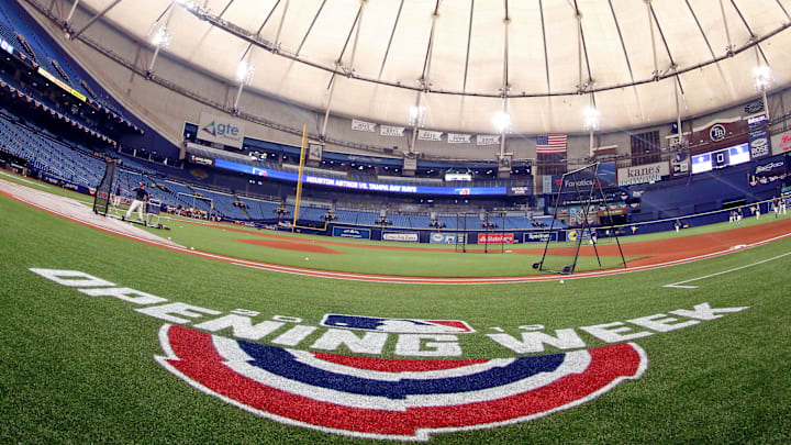 A general view of Tropicana Field as opening week logo lays on the turf prior to opening day between the Tampa Bay Rays and Houston Astros in March of 2019. A general view of Tropicana Field as opening week logo lays on the turf prior to opening day between the Tampa Bay Rays and Houston Astros in March of 2019.