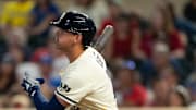 Jul 29, 2025; Minneapolis, Minnesota, USA; Minnesota Twins shortstop Brooks Lee (2) hits a two run home run during the ninth inning against the Boston Red Sox at Target Field. Mandatory Credit: Jordan Johnson-Imagn Images