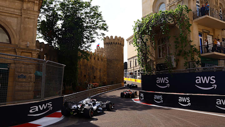 Nyck de Vries of Netherlands driving the (21) Scuderia AlphaTauri AT04 follows Zhou Guanyu of China driving the (24) Alfa Romeo F1 C43 Ferrari during the F1 Grand Prix of Azerbaijan at Baku City Circuit on April 30, 2023 in Baku, Azerbaijan. (Photo by Alex Pantling/Getty Images)