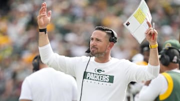 Sep 15, 2024; Green Bay, Wisconsin, USA;  Green Bay Packers head coach Matt LaFleur gestures to the crowd during the fourth quarter against the Indianapolis Colts at Lambeau Field. Mandatory Credit: Jeff Hanisch-Imagn Images