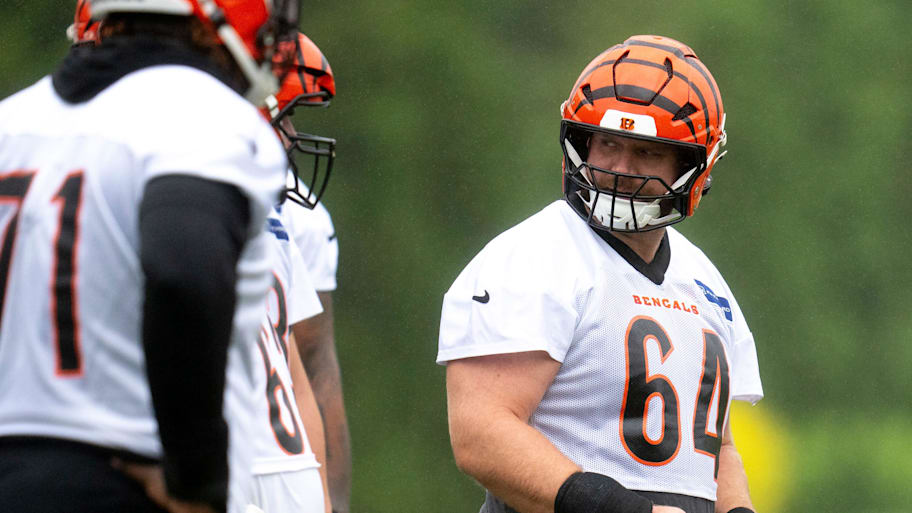 Cincinnati Bengals center Ted Karras (64) prepares to snap the ball during the Cincinnati Bengals practice in Cincinnati on Tuesday, May 27, 2025. | Albert Cesare/The Enquirer / USA TODAY NETWORK via Imagn Images