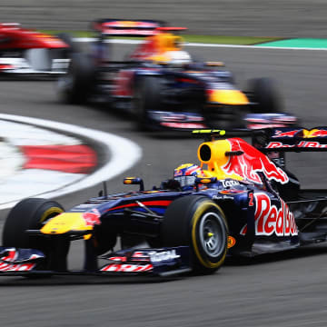 Mark Webber of Australia and Red Bull Racing leads from Sebastian Vettel of Germany and Red Bull Racing and Fernando Alonso of Spain and Ferrari during the German Formula One Grand Prix at the Nurburgring on July 24, 2011 in Nuerburg, Germany. (Photo by Clive Mason/Getty Images)
