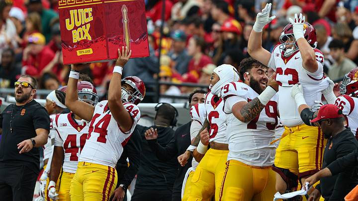 Sep 19, 2026; Piscataway, New Jersey, USA;  USC Trojans offensive lineman Cash Jacobsen (63) and defensive tackle Braeden Jones (44) celebrate with teammates during the second half against the Rutgers Scarlet Knights at SHI Stadium. Mandatory Credit: Vincent Carchietta-Imagn Images