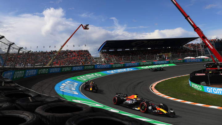 Max Verstappen of the Netherlands driving the (1) Oracle Red Bull Racing RB18 leads Sergio Perez of Mexico driving the (11) Oracle Red Bull Racing RB18 during the F1 Grand Prix of The Netherlands at Circuit Zandvoort on August 27, 2023 in Zandvoort, Netherlands. (Photo by Peter Fox/Getty Images) 