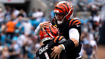 Cincinnati Bengals wide receiver Ja'Marr Chase (1) celebrates with Cincinnati Bengals quarterback Joe Burrow (9) after scoring a touchdown in the second quarter of the NFL game against the Carolina Panthers at Bank of America Stadium in Charlotte, N.C., on Sunday, Sept. 29, 2024.