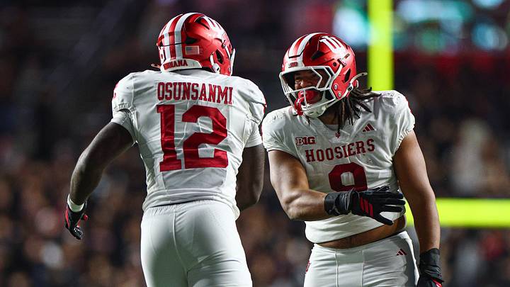Oct 3, 2026; Piscataway, New Jersey, USA; Indiana Hoosiers defensive lineman Stephen Daley (9) celebrates a sick with defensive end Tobi Osunsanmi (12) during the second half against the Rutgers Scarlet Knights at SHI Stadium. Mandatory Credit: Vincent Carchietta-Imagn Images