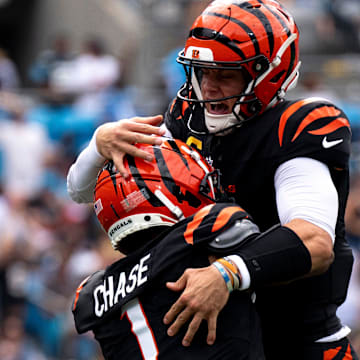 Cincinnati Bengals wide receiver Ja'Marr Chase (1) celebrates with Cincinnati Bengals quarterback Joe Burrow (9) after scoring a touchdown in the second quarter of the NFL game against the Carolina Panthers at Bank of America Stadium in Charlotte, N.C., on Sunday, Sept. 29, 2024.