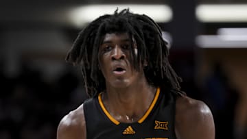 Jan 18, 2025; Cincinnati, Ohio, USA;  Arizona State Sun Devils forward Jayden Quaintance (21) controls the ball against the Cincinnati Bearcats in the second half at Fifth Third Arena. Mandatory Credit: Aaron Doster-Imagn Images