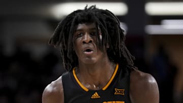Jan 18, 2025; Cincinnati, Ohio, USA;  Arizona State Sun Devils forward Jayden Quaintance (21) controls the ball against the Cincinnati Bearcats in the second half at Fifth Third Arena. Mandatory Credit: Aaron Doster-Imagn Images