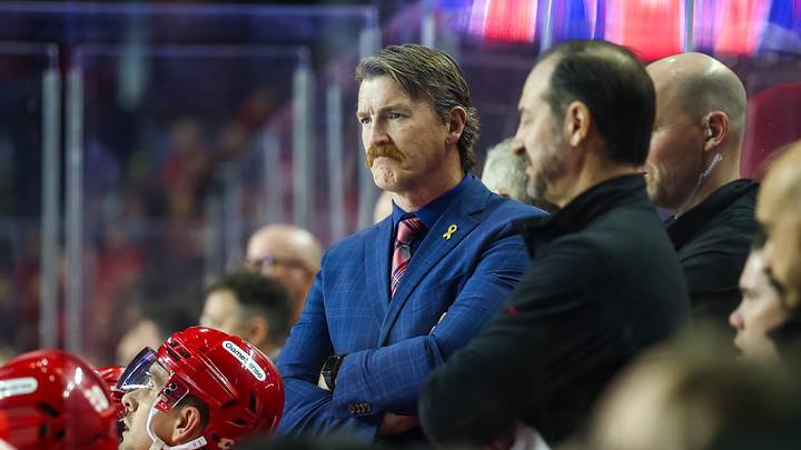 Jan 23, 2025; Calgary, Alberta, CAN; Calgary Flames interim assistant coach Trent Cull on his bench against the Buffalo Sabres during the second period at Scotiabank Saddledome. Mandatory Credit: Sergei Belski-Imagn Images