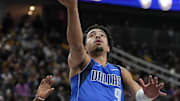 Oct 15, 2025; Las Vegas, Nevada, USA; Dallas Mavericks guard Ryan Nembhard (9) shoots a layup against the Los Angeles Lakers during the first half at T-Mobile Arena. Mandatory Credit: Lucas Peltier-Imagn Images