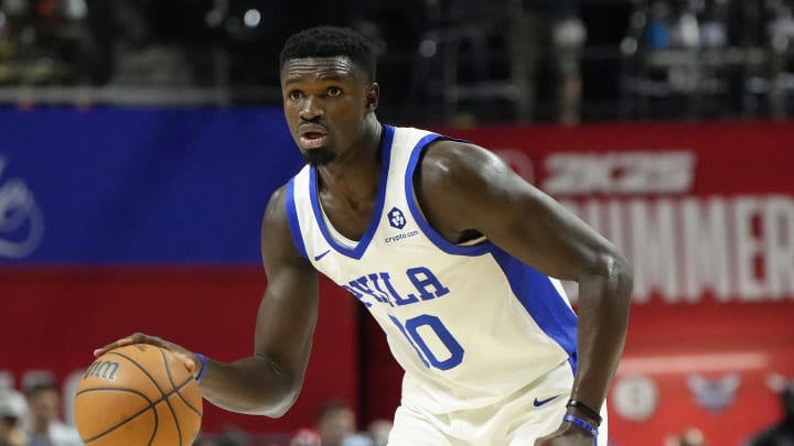 Jul 15, 2024; Las Vegas, NV, USA; Philadelphia 76ers forward/center Adem Bona (30) dribbles the ball against the Portland Trail Blazers during the second half at Thomas & Mack Center. Mandatory Credit: Lucas Peltier-USA TODAY Sports