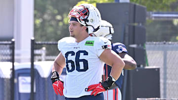 Jul 28, 2025; Foxborough, MA, USA; New England Patriots offensive tackle Will Campbell (66) takes a break during warm-ups  at training camp at Gillette Stadium. Mandatory Credit: Eric Canha-Imagn Images