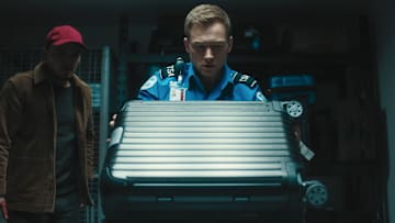 Carry-On. (L-R) Tonatiuh as Mateo Flores and Taron Egerton as Ethan Kopek in Carry-On. Cr. Netflix © 2024.