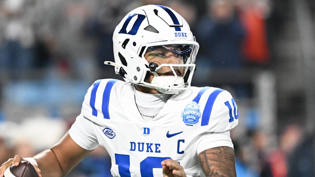 Dec 6, 2025; Charlotte, NC, USA; Duke Blue Devils quarterback Darian Mensah (10) looks to throw in the second quarter against the Virginia Cavaliers during the 2025 ACC Championship game at Bank of America Stadium. Mandatory Credit: Bob Donnan-Imagn Images