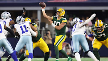 Jan 14, 2024; Arlington, Texas, USA; Green Bay Packers quarterback Jordan Love (10) drops back to pass against the Dallas Cowboys in the first half of the 2024 NFC wild card game at AT&T Stadium. Mandatory Credit: Kevin Jairaj-Imagn Images