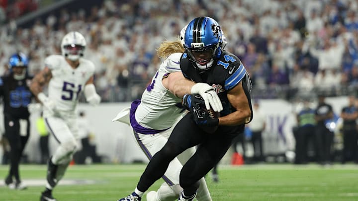 Dec 25, 2025; Minneapolis, Minnesota, USA; Minnesota Vikings linebacker Andrew van Ginkel (43) tackles Detroit Lions wide receiver Amon-Ra St. Brown (14) after a reception in the second quarter at U.S. Bank Stadium. Mandatory Credit: Matt Krohn-Imagn Images