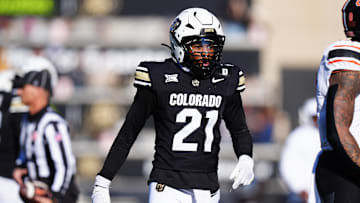 Nov 29, 2024; Boulder, Colorado, USA; Colorado Buffaloes safety Shilo Sanders (21) reacts in the second quarter against the Oklahoma State Cowboys at Folsom Field. Mandatory Credit: Ron Chenoy-Imagn Images
