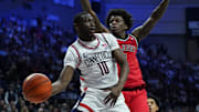 Feb 7, 2025; Storrs, Connecticut, USA; UConn Huskies guard Hassan Diarra (10) passes the ball against St. John's Red Storm guard Kadary Richmond (1) in the first half at Harry A. Gampel Pavilion. Mandatory Credit: David Butler II-Imagn Images