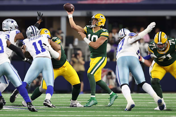 Green Bay Packers quarterback Jordan Love (10) drops back to pass against the Dallas Cowboys in the 2023 playoffs.
