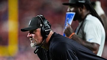 Detroit Lions head coach Dan Campbell watches a play against Kansas City Chiefs next to defensive coordinator Kelvin Sheppard during the second half at Arrowhead Stadium in Kansas City, Missouri on Sunday, Oct. 12, 2025.