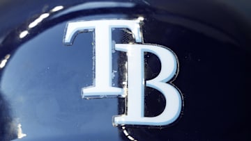 Aug 9, 2022; Milwaukee, Wisconsin, USA;  The Tampa Bay Rays logo on a batting helmet prior to the game against the Milwaukee Brewers at American Family Field. Mandatory Credit: Jeff Hanisch-Imagn Images